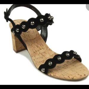 Black suede sandals with gold studs
